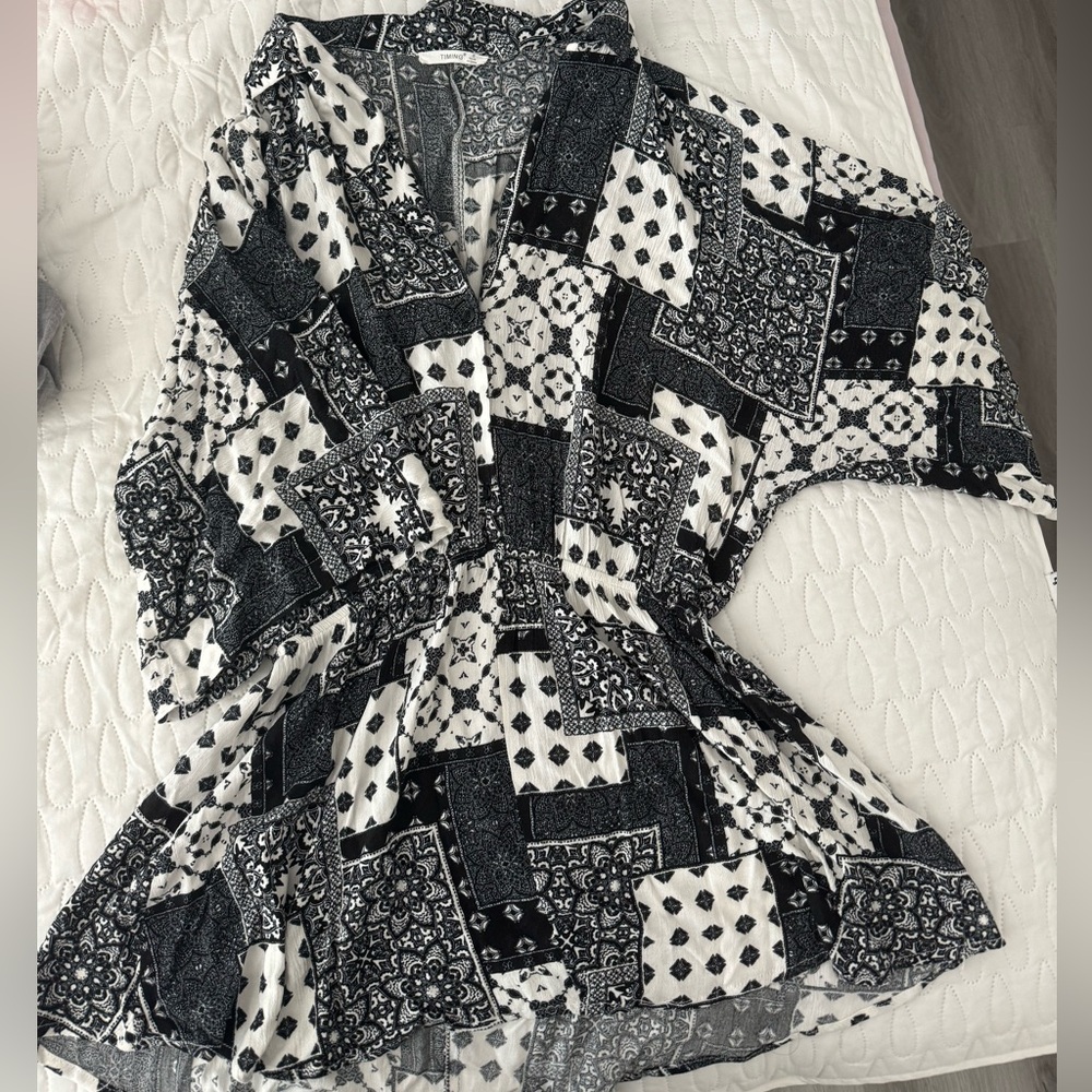 Paisley print peplum style top